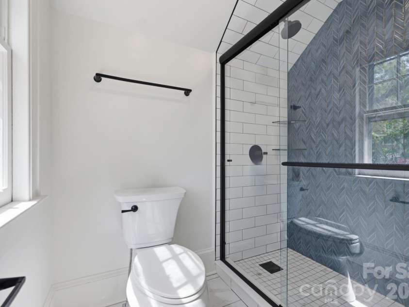 41 Chiles Avenue, Asheville, NC 28803.  MLS# CAR4374046, YatesRealty ID 27930. Beautiful shower in upstairs bath