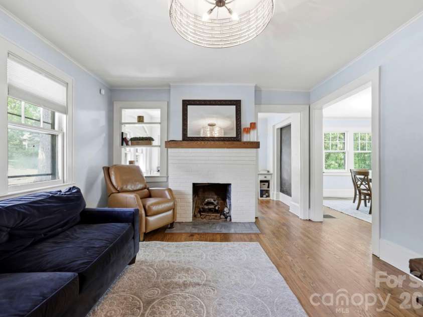 41 Chiles Avenue, Asheville, NC 28803.  MLS# CAR4374046, YatesRealty ID 27930. Cozy living room with adjoining office or craft room