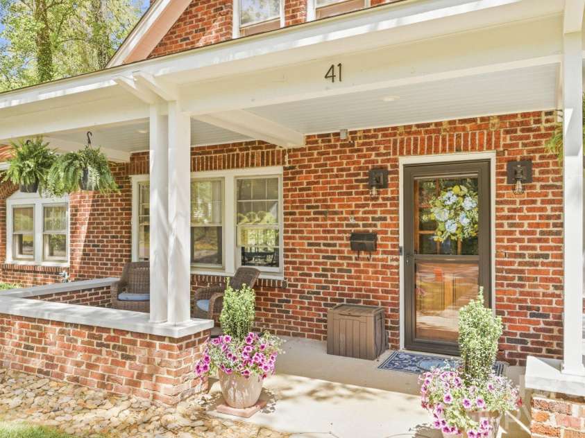 41 Chiles Avenue, Asheville, NC 28803.  MLS# CAR4374046, YatesRealty ID 27930. Relax with coffee on covered front porch