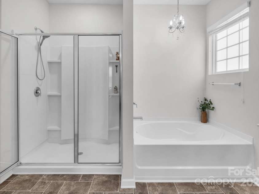 117 Rush Street, Mooresville, NC 28115.  MLS# CAR4280130, YatesRealty ID 27935. Large shower and separate bathtub