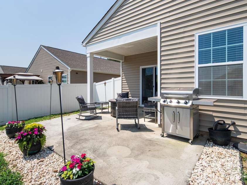 117 Rush Street, Mooresville, NC 28115.  MLS# CAR4280130, YatesRealty ID 27935. Lovely backyard patio