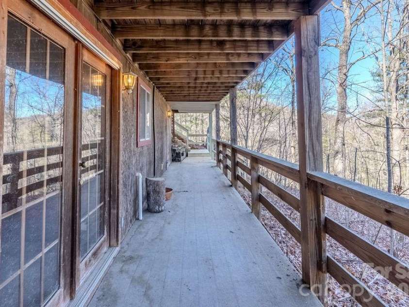 465 Enchanted Forest Drive, Sylva, NC 28779.  MLS# CAR4341154, YatesRealty ID 2794. Lower Porch