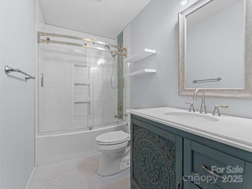 690 Mountain Road, Hendersonville, NC 28791.  MLS# CAR4280756, YatesRealty ID 27941. 