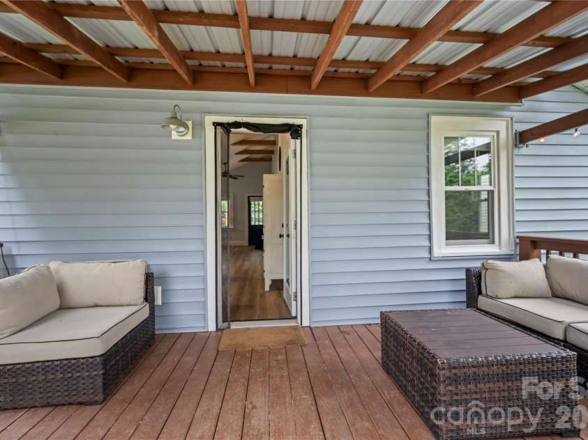 130 Winston Avenue, Asheville, NC 28803.  MLS# CAR4385170, YatesRealty ID 27944. Spacious covered back deck for lounging