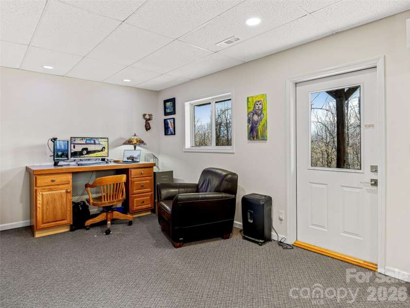 150 Hobby Horse Lane, Hendersonville, NC 28792.  MLS# CAR4397128, YatesRealty ID 27946. Flexible Lower-Level Office or Studio Space