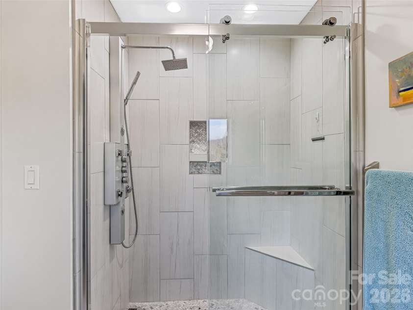 150 Hobby Horse Lane, Hendersonville, NC 28792.  MLS# CAR4397128, YatesRealty ID 27946. Updated Bath Featuring Walk-in Shower