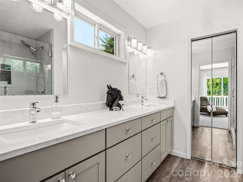 150 Hobby Horse Lane, Hendersonville, NC 28792.  MLS# CAR4397128, YatesRealty ID 27946. Updated Primary Bath with Double Vanity