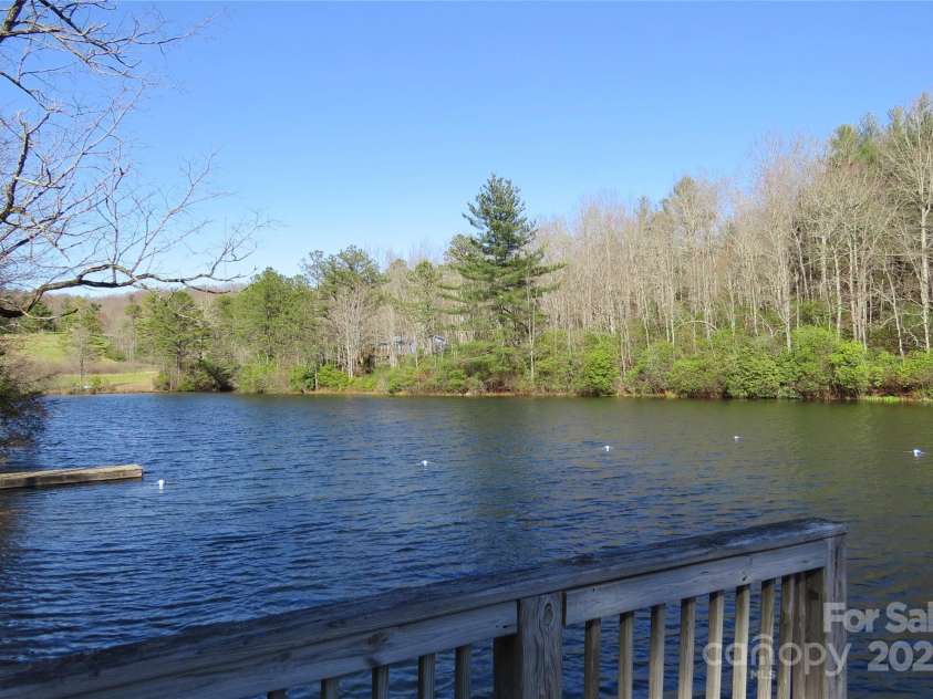 210 Ballard Road, Brevard, NC 28712.  MLS# CAR4300398, YatesRealty ID 2795. Community lake