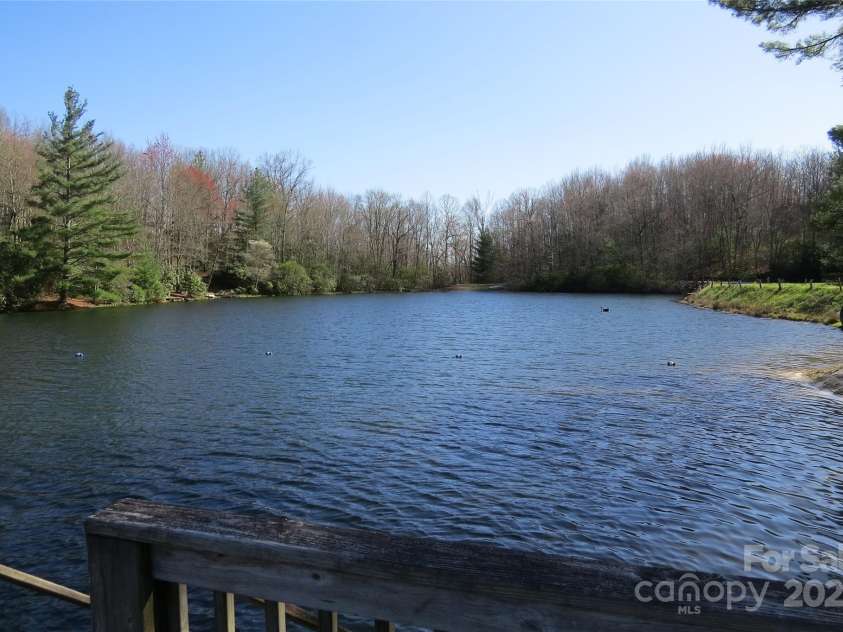 210 Ballard Road, Brevard, NC 28712.  MLS# CAR4300398, YatesRealty ID 2795. Community lake