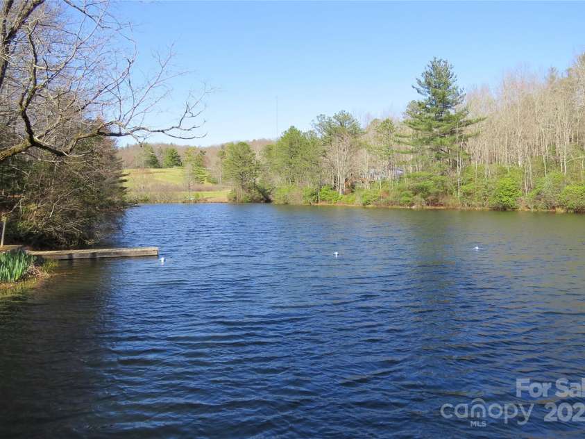 210 Ballard Road, Brevard, NC 28712.  MLS# CAR4300398, YatesRealty ID 2795. Community lake