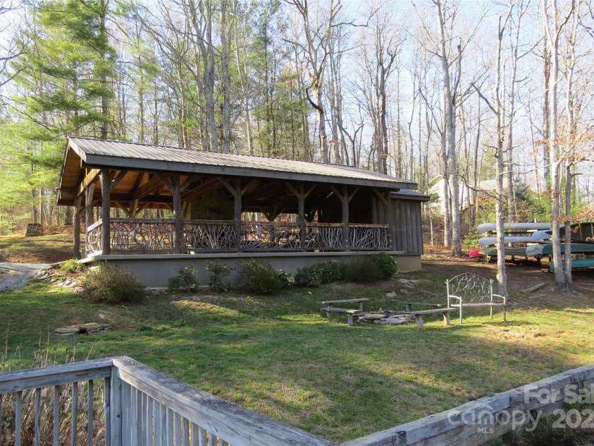 210 Ballard Road, Brevard, NC 28712.  MLS# CAR4300398, YatesRealty ID 2795. Community pavilion, fire pit, and boat storage
