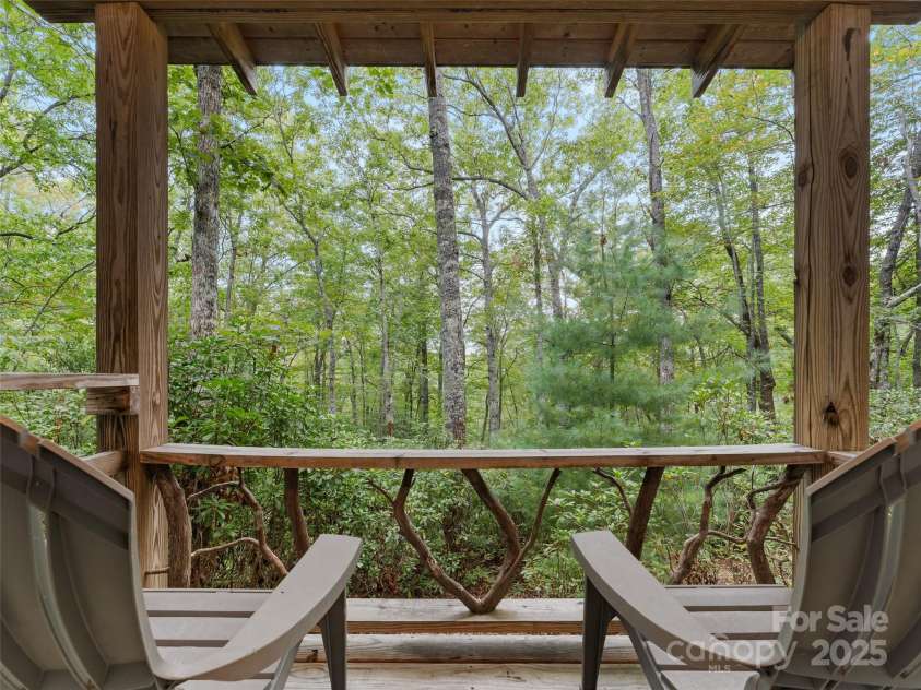 210 Ballard Road, Brevard, NC 28712.  MLS# CAR4300398, YatesRealty ID 2795. Covered Back Deck Basement Level