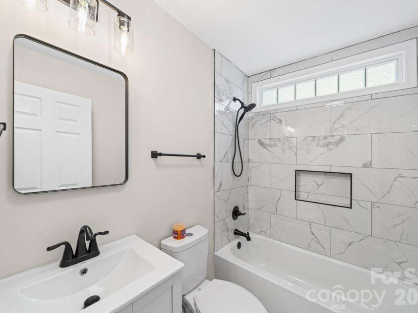 2327 Sunset Drive, Gastonia, NC 28054.  MLS# CAR4373394, YatesRealty ID 27950. Hallway Bathroom