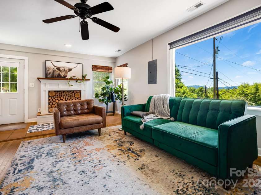 54 Vine Street, Asheville, NC 28804.  MLS# CAR4283622, YatesRealty ID 27951. Upper unit living space with views