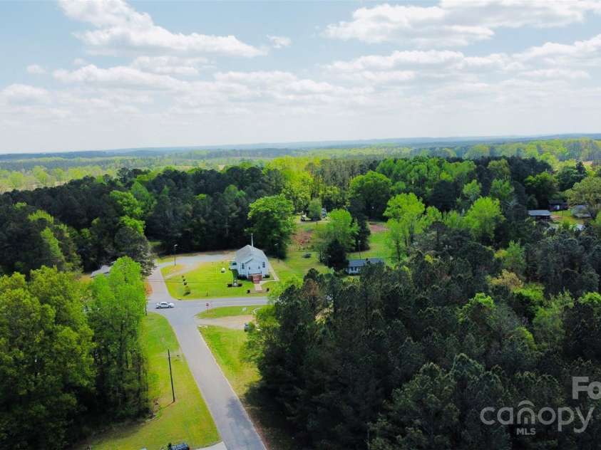 141 Lewis Street, Mount Gilead, NC 27306.  MLS# CAR4248799, YatesRealty ID 27952. Aerial from property