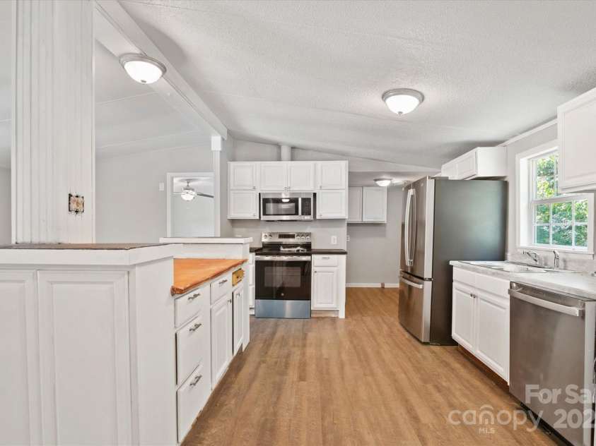 141 Lewis Street, Mount Gilead, NC 27306.  MLS# CAR4248799, YatesRealty ID 27952. All new stainless appliances