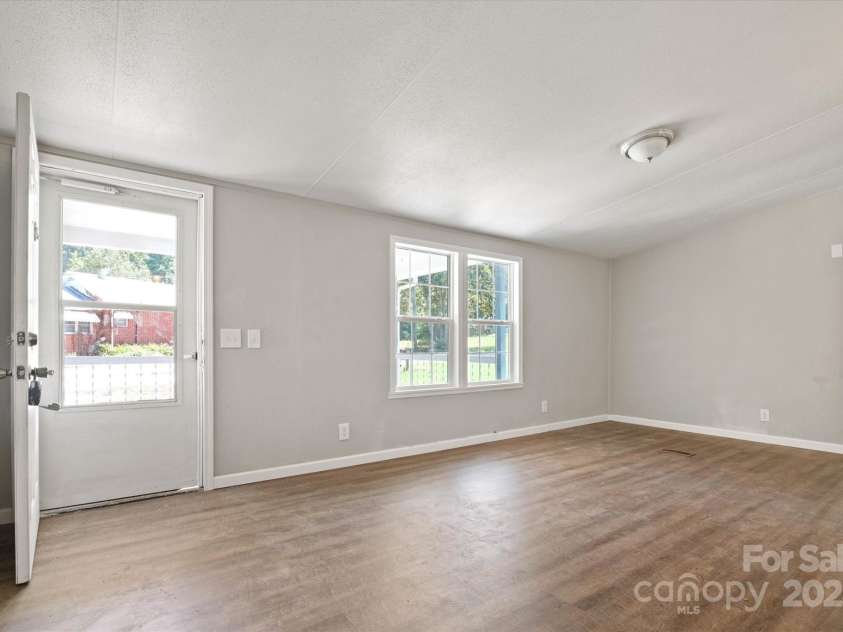 141 Lewis Street, Mount Gilead, NC 27306.  MLS# CAR4248799, YatesRealty ID 27952. Large living room