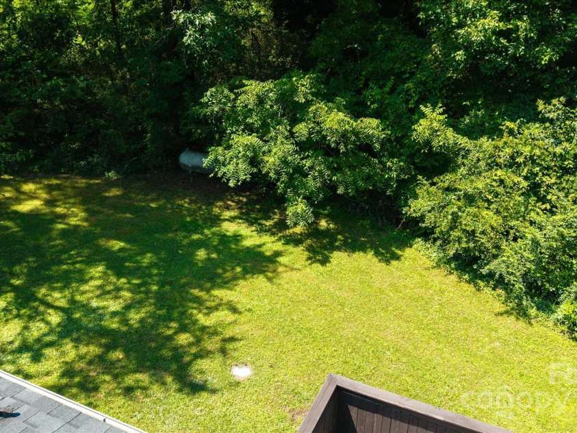 141 Lewis Street, Mount Gilead, NC 27306.  MLS# CAR4248799, YatesRealty ID 27952. Large yard