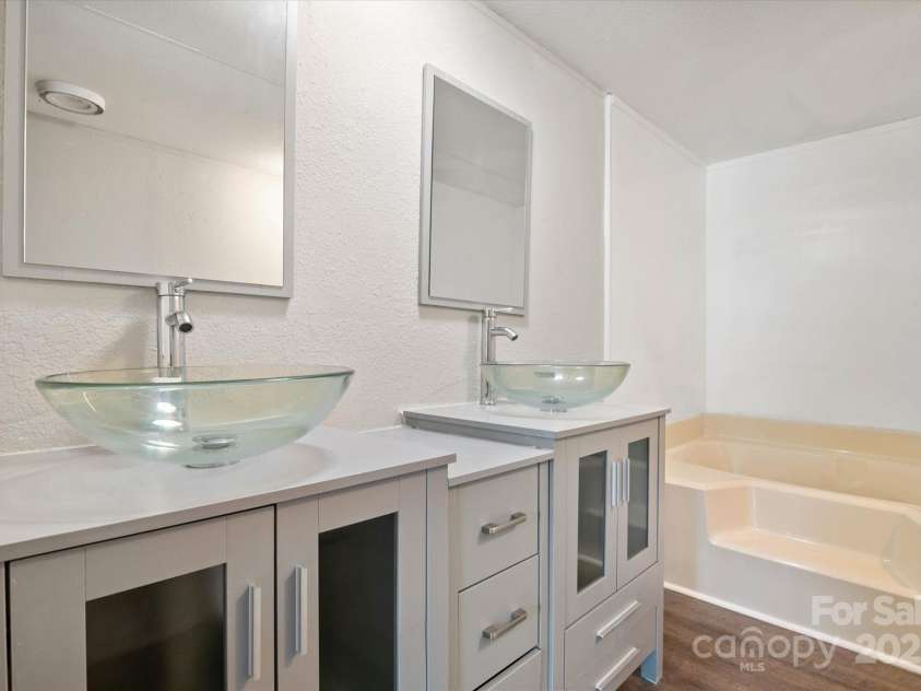 141 Lewis Street, Mount Gilead, NC 27306.  MLS# CAR4248799, YatesRealty ID 27952. Owners bathroom