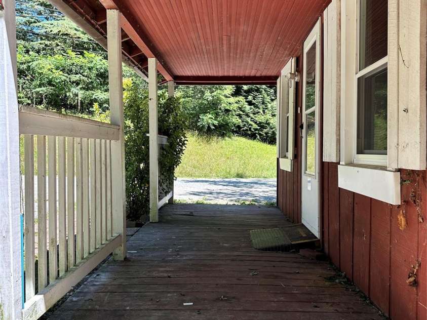 36 Range Road, Etowah, NC 28729.  MLS# CAR4390019, YatesRealty ID 27953. Front porch