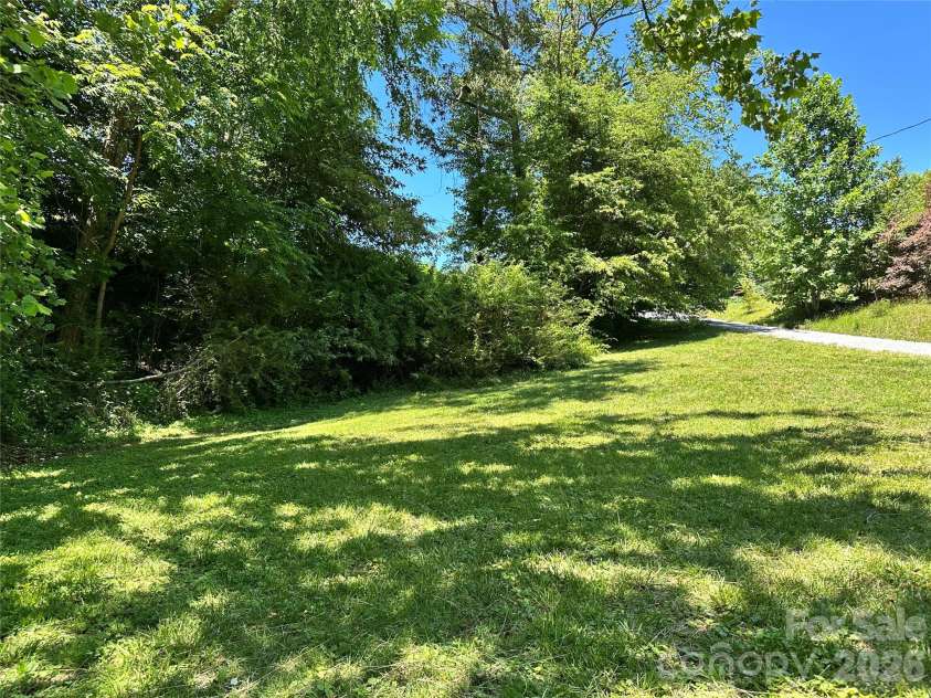 36 Range Road, Etowah, NC 28729.  MLS# CAR4390019, YatesRealty ID 27953. Front yard