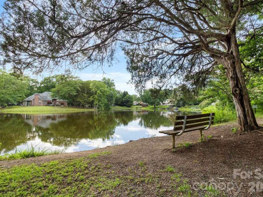 5903 Carpenter Drive, Charlotte, NC 28226.  MLS# CAR4388305, YatesRealty ID 27954. Community pond.