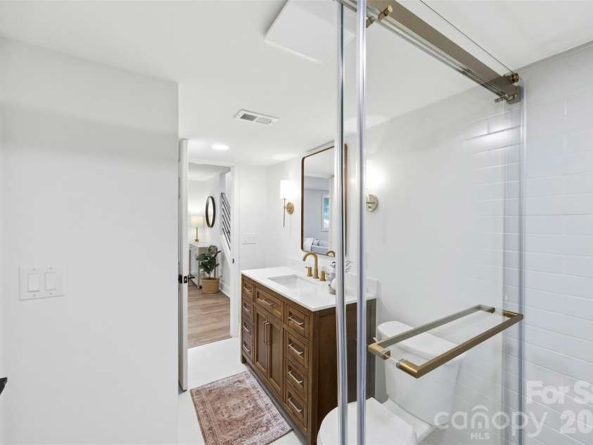 5903 Carpenter Drive, Charlotte, NC 28226.  MLS# CAR4388305, YatesRealty ID 27954. Full bathroom in lower level. 
