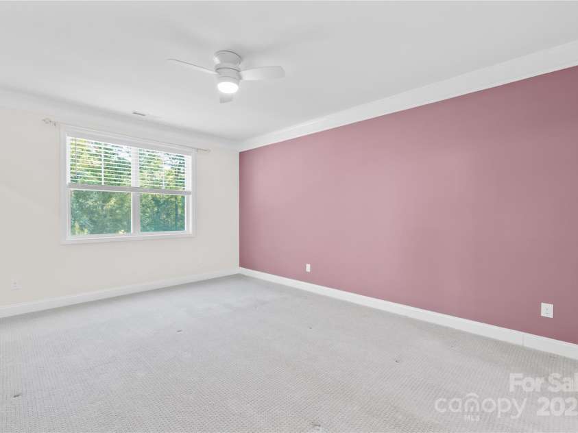 201 Hanks Bluff Drive, Mooresville, NC 28117.  MLS# CAR4273900, YatesRealty ID 27955. Large primary bedroom