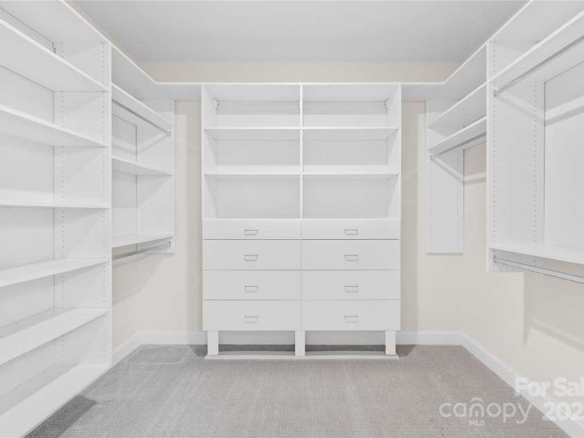 201 Hanks Bluff Drive, Mooresville, NC 28117.  MLS# CAR4273900, YatesRealty ID 27955. Professionally designed Primary Closet