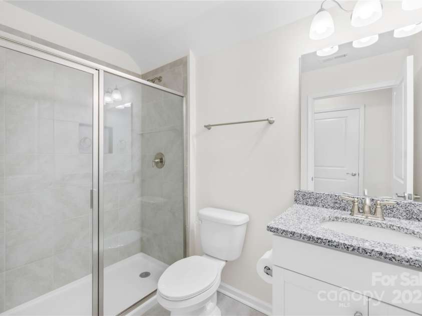 201 Hanks Bluff Drive, Mooresville, NC 28117.  MLS# CAR4273900, YatesRealty ID 27955. Upstairs 3rd bathroom