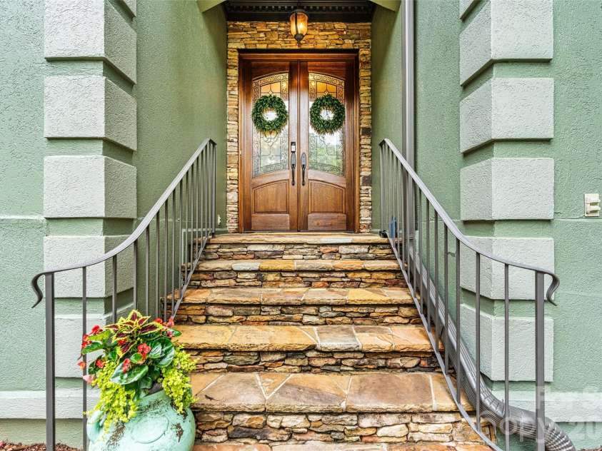 5028 Foxbriar Trail, Charlotte, NC 28269.  MLS# CAR4380862, YatesRealty ID 27956. Stone step front entry