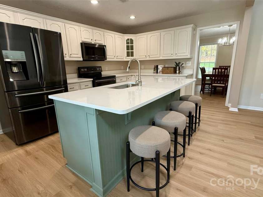 9372 Island Point Road, Sherrills Ford, NC 28673.  MLS# CAR4265031, YatesRealty ID 27957. Refreshed kitchen with new quartz counters