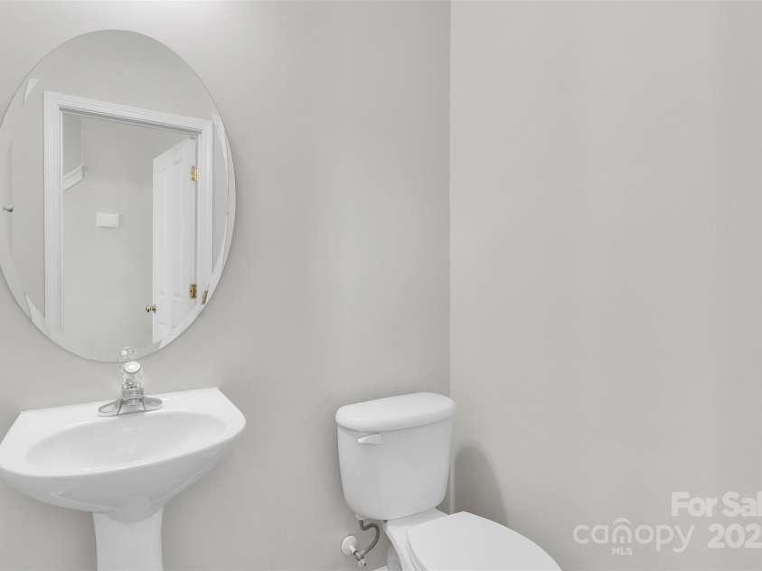 1821 Ethel Guest Lane, Charlotte, NC 28206.  MLS# CAR4276881, YatesRealty ID 27963. Convenient and spacious half bath downstairs