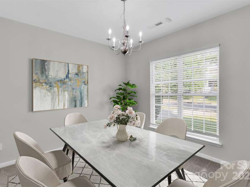 1821 Ethel Guest Lane, Charlotte, NC 28206.  MLS# CAR4276881, YatesRealty ID 27963. Flex space on the main level can be so many things! (virtually staged)