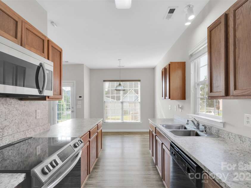 1821 Ethel Guest Lane, Charlotte, NC 28206.  MLS# CAR4276881, YatesRealty ID 27963. Spacious kitchen with tons of counter space
