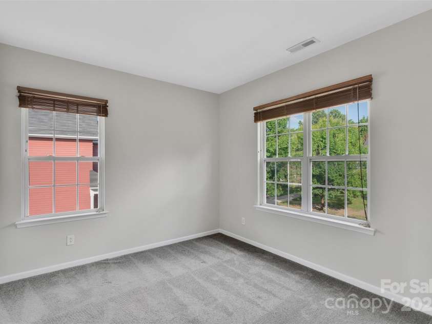 1821 Ethel Guest Lane, Charlotte, NC 28206.  MLS# CAR4276881, YatesRealty ID 27963. Spacious secondary bedroom