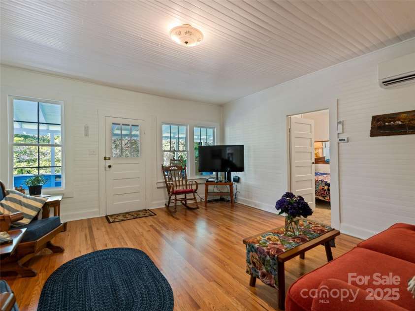 556 Crawford Cemetery Road, Sylva, NC 28779.  MLS# CAR4281056, YatesRealty ID 27964. Living Room