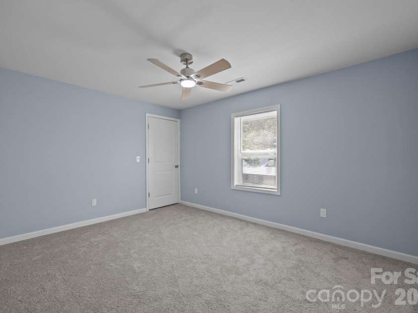 593 Cedar Creek Road, Biscoe, NC 27209.  MLS# CAR4214705, YatesRealty ID 27965. Bedroom 2