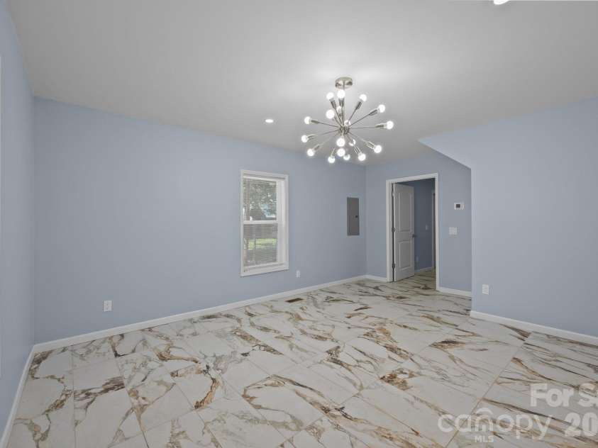 593 Cedar Creek Road, Biscoe, NC 27209.  MLS# CAR4214705, YatesRealty ID 27965. Dining room