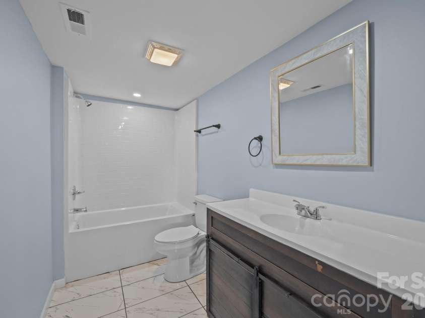 593 Cedar Creek Road, Biscoe, NC 27209.  MLS# CAR4214705, YatesRealty ID 27965. Full bathroom - main level