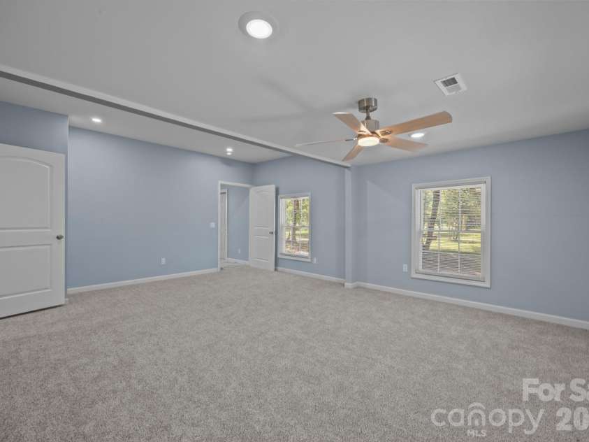 593 Cedar Creek Road, Biscoe, NC 27209.  MLS# CAR4214705, YatesRealty ID 27965. Primary bedroom