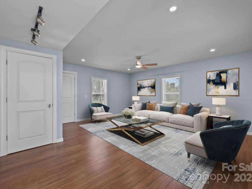 593 Cedar Creek Road, Biscoe, NC 27209.  MLS# CAR4214705, YatesRealty ID 27965. Virtually staged - Living Room