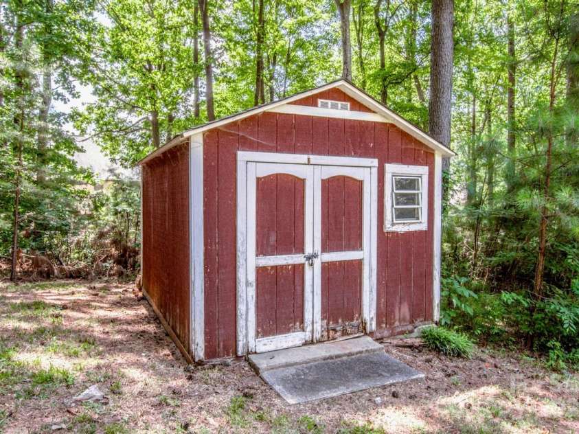 135 Woodstork Cove Drive, Mooresville, NC 28117.  MLS# CAR4282213, YatesRealty ID 27968. Storage shed.