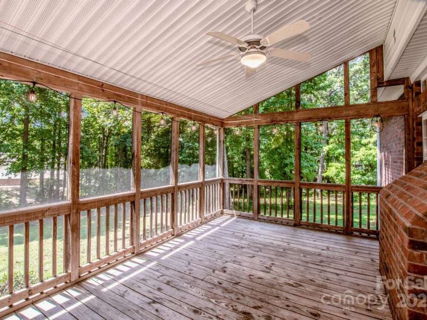 135 Woodstork Cove Drive, Mooresville, NC 28117.  MLS# CAR4282213, YatesRealty ID 27968. Who doesn't love a screened in back porch?