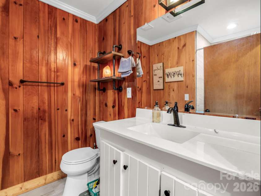 670 Cedar Creek Road, Lake Lure, NC 28746.  MLS# CAR4382823, YatesRealty ID 27969. Guest Bathroom on main
