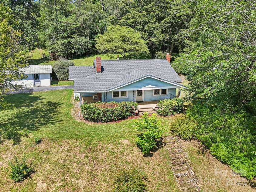 203 Beaverdam Road, Candler, NC 28715.  MLS# CAR4282589, YatesRealty ID 27973. Ariel Exterior