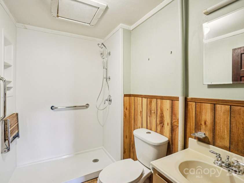 203 Beaverdam Road, Candler, NC 28715.  MLS# CAR4282589, YatesRealty ID 27973. Bathroom