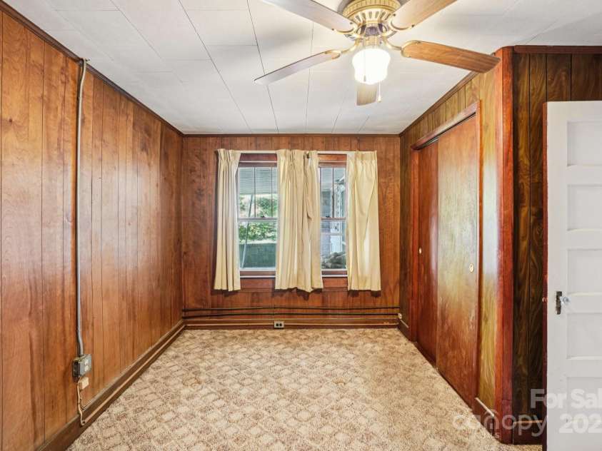 203 Beaverdam Road, Candler, NC 28715.  MLS# CAR4282589, YatesRealty ID 27973. Bedroom 2