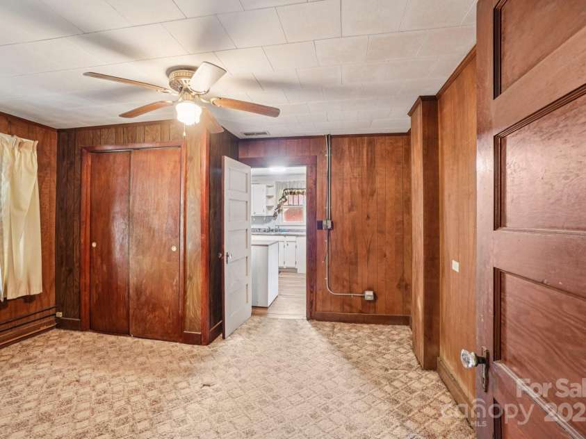 203 Beaverdam Road, Candler, NC 28715.  MLS# CAR4282589, YatesRealty ID 27973. Bedroom 2, angle 2