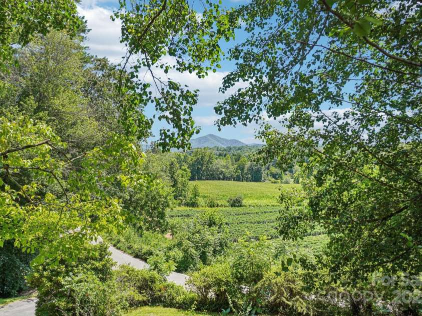 203 Beaverdam Road, Candler, NC 28715.  MLS# CAR4282589, YatesRealty ID 27973. Detail view